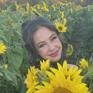 a person holding a flower