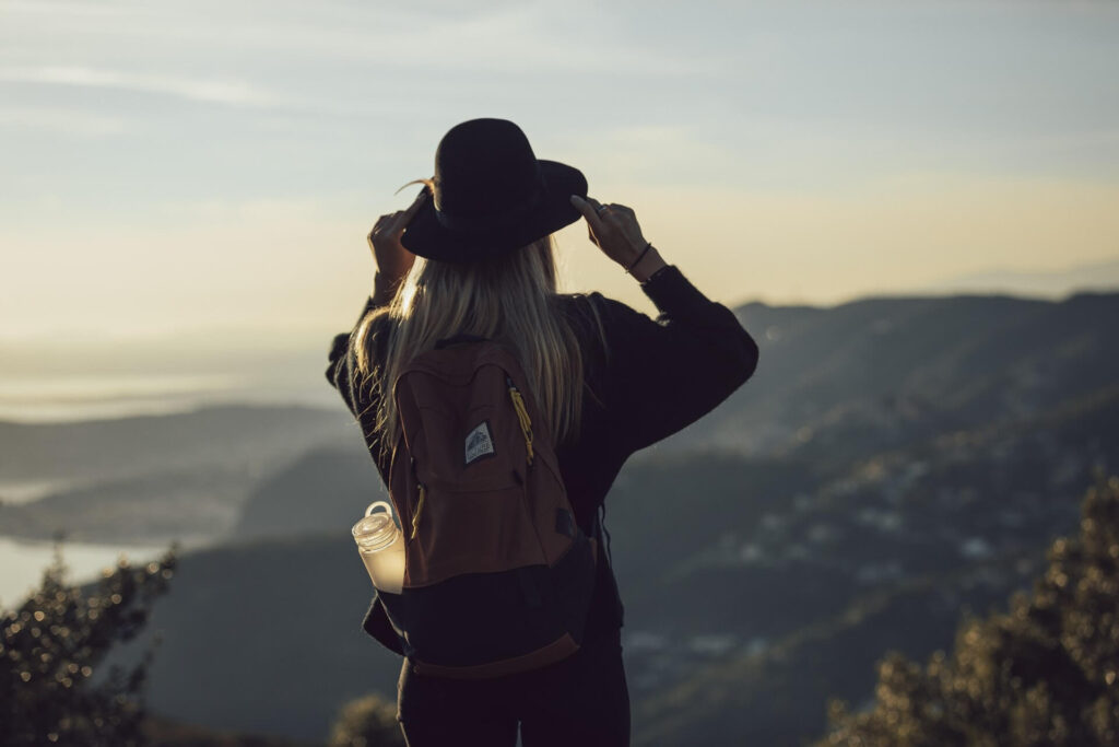 a person standing on top of a mountain